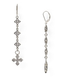 Crafted from sterling silver with striking cubic zirconia stones, Queen Baby's rock n' roll-inspired drop earrings will add glamor and attitude to your look. Crafted from sterling silver with striking cubic zirconia stones, Queen Baby's rock n' roll-inspired drop earrings will add glamor and attitude to your look.