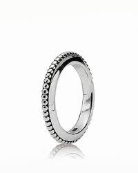 This stackable sterling silver ring from PANDORA bears a tribal-inspired patterned texture. This stackable sterling silver ring from PANDORA bears a tribal-inspired patterned texture.