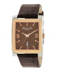 An incomparable blend of a robust facade and an elegant center, by Kenneth Cole New York. Watch crafted of brown croc-embossed leather strap and rectangular rose-gold plated stainless steel case. Brown dial features rose-gold tone applied numerals at three and nine o'clock, stick indices, date window at six o'clock, rose-gold tone three hands and logo at twelve o'clock. Quartz movement. Water resistant to 30 meters. Limited lifetime warranty. An incomparable blend of a robust facade and an elegant center, by Kenneth Cole New York. Watch crafted of brown croc-embossed leather strap and rectangular rose-gold plated stainless steel case. Brown dial features rose-gold tone applied numerals at three and nine o'clock, stick indices, date window at six o'clock, rose-gold tone three hands and logo at twelve o'clock. Quartz movement. Water resistant to 30 meters. Limited lifetime warranty.