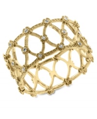 Lovely in lattice. This bangle bracelet from 2028 blends timeless elegance with modern appeal with glass accents and intricate openwork detail. Crafted in gold tone mixed metal. Approximate length: 7 inches. Lovely in lattice. This bangle bracelet from 2028 blends timeless elegance with modern appeal with glass accents and intricate openwork detail. Crafted in gold tone mixed metal. Approximate length: 7 inches.