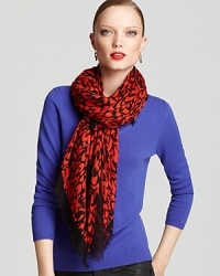 On-trend animal print gets a fiery update with MARC BY MARC JACOBS' vibrant red-and-black scarf. On-trend animal print gets a fiery update with MARC BY MARC JACOBS' vibrant red-and-black scarf.
