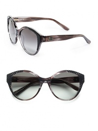 THE LOOKCat-eye's silhouetteAcetate framesMetal logo at templesUV protectionSignature case includedTHE COLORTranslucent black tortoise frames with striped detailing and grey gradient lensesORIGINMade in France THE LOOKCat-eye's silhouetteAcetate framesMetal logo at templesUV protectionSignature case includedTHE COLORTranslucent black tortoise frames with striped detailing and grey gradient lensesORIGINMade in France
