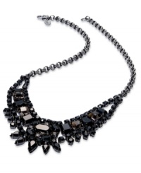 Leave no stone unturned in your quest for style. This bib necklace from Juicy Couture is crafted from brass with jet black stones in a range of shapes for an opulent statement. Approximate length: 18 inches. Approximate drop: 3-1/3 inches. Approximate width: 5 inches. Leave no stone unturned in your quest for style. This bib necklace from Juicy Couture is crafted from brass with jet black stones in a range of shapes for an opulent statement. Approximate length: 18 inches. Approximate drop: 3-1/3 inches. Approximate width: 5 inches.