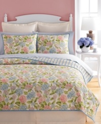 Fancy florals. Martha Stewart Collection's Hydrangea sham features blooming flowers in an array of pink, purple and blue hues for a look full of nature-inspired charm. Finished with allover quilting details for plush texture. Reverses to a stripe pattern. Fancy florals. Martha Stewart Collection's Hydrangea sham features blooming flowers in an array of pink, purple and blue hues for a look full of nature-inspired charm. Finished with allover quilting details for plush texture. Reverses to a stripe pattern.