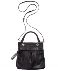 Take this fabulously functional Jessica Simplson design with you wherever your adventures may lead. Flirty tassel, silver-tone hardware and detail stitching add instant panache, while the convenient crossbody strap keeps hands free when you're on the move. Take this fabulously functional Jessica Simplson design with you wherever your adventures may lead. Flirty tassel, silver-tone hardware and detail stitching add instant panache, while the convenient crossbody strap keeps hands free when you're on the move.