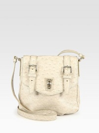 Perfect for all your essentials, this ostrich stamped leather design features a logo engraved turn-lock closure.Adjustable shoulder strap, 19½-22½ dropTurn-lock flap closureBuckled strap adornment on outside flapOne inside zip pocketFully lined8¾W X 8H X 2DImported Perfect for all your essentials, this ostrich stamped leather design features a logo engraved turn-lock closure.Adjustable shoulder strap, 19½-22½ dropTurn-lock flap closureBuckled strap adornment on outside flapOne inside zip pocketFully lined8¾W X 8H X 2DImported