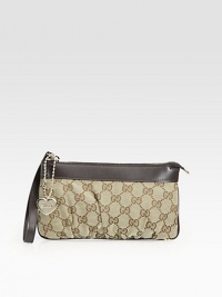 Signature GG jacquard, softly pleated and topped with leather trim and a heart key-chain.Wristlet strapTop zip closureSix credit card slotsFully lined8½W X 5H X 1/2DMade in Italy Signature GG jacquard, softly pleated and topped with leather trim and a heart key-chain.Wristlet strapTop zip closureSix credit card slotsFully lined8½W X 5H X 1/2DMade in Italy