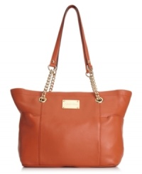 A more trend-right take on a traditional tote, this sleek leather lovely is finished with gleaming signature hardware and chain-link detailing. Poised and pocket-lined, the generous design will work from desk-to-dinner. A more trend-right take on a traditional tote, this sleek leather lovely is finished with gleaming signature hardware and chain-link detailing. Poised and pocket-lined, the generous design will work from desk-to-dinner.