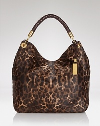 An enviable blend of luxury and functionality, this shoulder bag from Michael Kors is an effortless daytime choice, crafted of gorgeously textured calf hair with leather accents. An enviable blend of luxury and functionality, this shoulder bag from Michael Kors is an effortless daytime choice, crafted of gorgeously textured calf hair with leather accents.