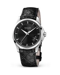 A diamante embossed face and leather strap lend Gucci's signature look to this versatile, timeless wristwatch. A diamante embossed face and leather strap lend Gucci's signature look to this versatile, timeless wristwatch.