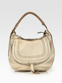 EXCLUSIVELY AT SAKS in Metallic Beige. A slouchy silhouette in frosted metallic calfskin leather, finished with a signature tennis-wrapped handle. Top handle, 8 dropTop zip closureHidden open pocket under flapOne inside zip pocketOne inside open pocketCotton lining15¾W X 15H X 5DMade in Italy EXCLUSIVELY AT SAKS in Metallic Beige. A slouchy silhouette in frosted metallic calfskin leather, finished with a signature tennis-wrapped handle. Top handle, 8 dropTop zip closureHidden open pocket under flapOne inside zip pocketOne inside open pocketCotton lining15¾W X 15H X 5DMade in Italy