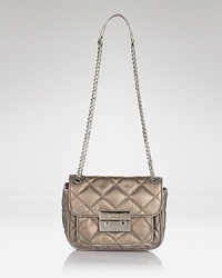 Richly crafted in quilted leather, this MICHAEL Michael Kors should flaunts effortless evening out allure. Slip it over the shoulder to add night-right polish. Richly crafted in quilted leather, this MICHAEL Michael Kors should flaunts effortless evening out allure. Slip it over the shoulder to add night-right polish.