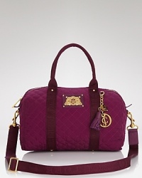 Be the envy of your friends with this quilted satchel from Juicy Couture. It flaunts a carry-it-all shape that proves extra versatile in durable nylon. Be the envy of your friends with this quilted satchel from Juicy Couture. It flaunts a carry-it-all shape that proves extra versatile in durable nylon.