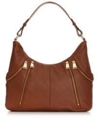 A slouchy silhouette gets a city-sleek upgrade with this Calvin Klein design, featuring edgy zipper accents. Soft leather is adorned with signature hardware and detail stitching, while the pocket-lined interior makes it an exquisitely organized option. A slouchy silhouette gets a city-sleek upgrade with this Calvin Klein design, featuring edgy zipper accents. Soft leather is adorned with signature hardware and detail stitching, while the pocket-lined interior makes it an exquisitely organized option.