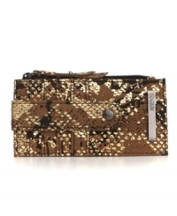An eye-catching design from Kenneth Cole Reaction, featuring a fun python print and sleek metallic accents. This essential credit card holder gives you no-fuss instant access to cards and cash. An eye-catching design from Kenneth Cole Reaction, featuring a fun python print and sleek metallic accents. This essential credit card holder gives you no-fuss instant access to cards and cash.
