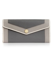 Slender and impossibly chic, this come-lately carryall from MICHAEL Michael Kors is the epitome of elegant accessorizing. Crafted from supple leather and discrete signature hardware, its interior is superbly organized with plenty of compartments for cards, coins, cash and ID. Slender and impossibly chic, this come-lately carryall from MICHAEL Michael Kors is the epitome of elegant accessorizing. Crafted from supple leather and discrete signature hardware, its interior is superbly organized with plenty of compartments for cards, coins, cash and ID.