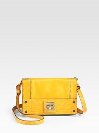A slim leather design with crocodile embossed leather trim in a smart and sophisticated crossbody style.Shoulder strap, 21½ dropTurnlock flap closureOne inside zip pocketSatin lining8½W X 5¼H X 2½DImported A slim leather design with crocodile embossed leather trim in a smart and sophisticated crossbody style.Shoulder strap, 21½ dropTurnlock flap closureOne inside zip pocketSatin lining8½W X 5¼H X 2½DImported