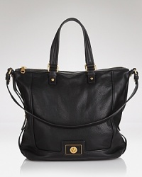 Bring daytime style to new, luxurious, heights with this leather tote from MARC BY MARC JACOBS. It's an effortless over-the-shoulder style, that plays off the label's citified edge. Bring daytime style to new, luxurious, heights with this leather tote from MARC BY MARC JACOBS. It's an effortless over-the-shoulder style, that plays off the label's citified edge.