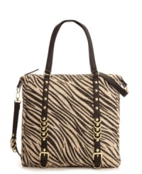 A zebra-printed straw tote with perfectly polished detail. This safari-chic style from Olivia + Joy features shiny goldtone hardware and edgy studded detail. A zebra-printed straw tote with perfectly polished detail. This safari-chic style from Olivia + Joy features shiny goldtone hardware and edgy studded detail.