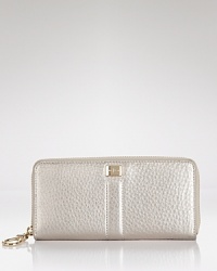 A hardworking wardrobe starts with timeless accessories like this leather wallet from Cole Haan. With pockets for the essentials, it goes from Monday to Friday with ease. A hardworking wardrobe starts with timeless accessories like this leather wallet from Cole Haan. With pockets for the essentials, it goes from Monday to Friday with ease.
