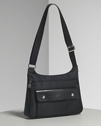 Longchamp Planete crossbody bag in nylon with single adjustable crossbody strap, silvertone hardware and leather trim. Features front zip closure and front exterior flap pocket. Longchamp Planete crossbody bag in nylon with single adjustable crossbody strap, silvertone hardware and leather trim. Features front zip closure and front exterior flap pocket.