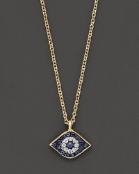Adorn yourself with sparkling diamonds and sapphires set in a 14K yellow gold pendant inspired by ancient traditions. Adorn yourself with sparkling diamonds and sapphires set in a 14K yellow gold pendant inspired by ancient traditions.