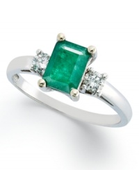 Enviable green hues. This vibrant 14k white gold ring features an emerald-cut emerald (3/4 ct. t.w.) and round-cut diamond side stones (1/5 ct. t.w.). Enviable green hues. This vibrant 14k white gold ring features an emerald-cut emerald (3/4 ct. t.w.) and round-cut diamond side stones (1/5 ct. t.w.).