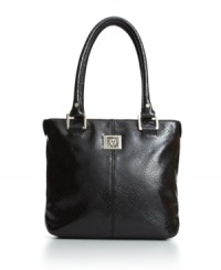 Go wild for this safari-chic tote by Anne Klein. A subtle snakeskin print covers this perfectly portable design while silvertone hardware adds just enough shine. Go wild for this safari-chic tote by Anne Klein. A subtle snakeskin print covers this perfectly portable design while silvertone hardware adds just enough shine.