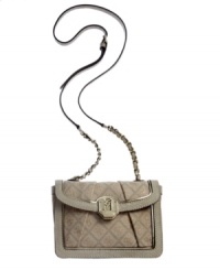 Lady-like and lovely, this petite yet surprisingly spacious silhouette from GUESS goes from deskside to dinner date in a wink. Graphic 4-G pattern and signature golden hardware lend a luxe look, while the well-organized interior stows phone, wallet and makeup with ease. Lady-like and lovely, this petite yet surprisingly spacious silhouette from GUESS goes from deskside to dinner date in a wink. Graphic 4-G pattern and signature golden hardware lend a luxe look, while the well-organized interior stows phone, wallet and makeup with ease.
