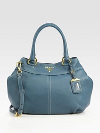 Shapely satchel in pebble-grain calfskin with a removable shoulder strap and logo luggage tag.Double top handles, 6½ dropRemovable, adjustable shoulder strap, 16-20 dropSnap top closureMetal lettering logoBrass hardwareProtective metal feetTwo inside pocketsPrada logo lining15W X 11H X 6DMade in Italy Shapely satchel in pebble-grain calfskin with a removable shoulder strap and logo luggage tag.Double top handles, 6½ dropRemovable, adjustable shoulder strap, 16-20 dropSnap top closureMetal lettering logoBrass hardwareProtective metal feetTwo inside pocketsPrada logo lining15W X 11H X 6DMade in Italy