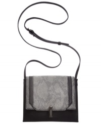 Urban cool with an uptown attitude, this petite pretty from RACHEL Rachel Roy works city girl chic. With python-embossed detailing and versatile crossbody strap, it's outfitted to explore any avenue. Urban cool with an uptown attitude, this petite pretty from RACHEL Rachel Roy works city girl chic. With python-embossed detailing and versatile crossbody strap, it's outfitted to explore any avenue.