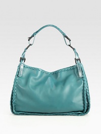 Vibrant leather in a slouched carryall edged with woven trim and snake-embossed straps.Adjustable shoulder straps, 7¼-10 dropMagnetic top closureOne inside zip pocketOne inside open pocketSuede lining10¼W X 10½H X 5DMade in Italy Vibrant leather in a slouched carryall edged with woven trim and snake-embossed straps.Adjustable shoulder straps, 7¼-10 dropMagnetic top closureOne inside zip pocketOne inside open pocketSuede lining10¼W X 10½H X 5DMade in Italy