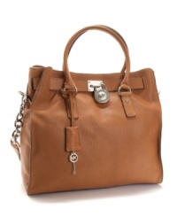 Keep your secret to looking fashionable under lock and key with the Hamilton Chain tote from Michael Kors. This luxe leather tote features a working lock with key that's hidden in the hanging leather tag. Keep your secret to looking fashionable under lock and key with the Hamilton Chain tote from Michael Kors. This luxe leather tote features a working lock with key that's hidden in the hanging leather tag.