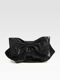 An oversized bow shapes the front of this darling bag, crafted from laminated calfskin in a convertible silhouette.Chain shoulder strap, 24 dropFlap snap closureOne inside zip pocketCotton lining11W X 7¼H X 1/2DMade in Italy An oversized bow shapes the front of this darling bag, crafted from laminated calfskin in a convertible silhouette.Chain shoulder strap, 24 dropFlap snap closureOne inside zip pocketCotton lining11W X 7¼H X 1/2DMade in Italy