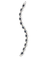 As if taken from a socialite's jewel box, this simply styled stone bracelet from Carolee flaunts an heirloom quality cast in rhodium plated metal. As if taken from a socialite's jewel box, this simply styled stone bracelet from Carolee flaunts an heirloom quality cast in rhodium plated metal.