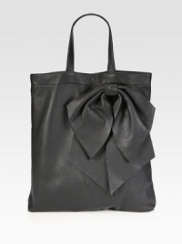 Sumptuous calfskin shaped by an oversized bow for a unique silhouette.Double top handles, 6½ dropTop snap closureInner zip pouchSuede lining13¼W X 15½H X 2DMade in Italy Sumptuous calfskin shaped by an oversized bow for a unique silhouette.Double top handles, 6½ dropTop snap closureInner zip pouchSuede lining13¼W X 15½H X 2DMade in Italy