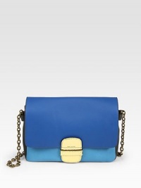 Supple colorblock lambskin in a demure flap bag finished with goldtone hardware and interior python trim.Chain shoulder strap, 14½ dropFlap closureOne outside zip pocketOne inside zip pocketOne inside open pocketLinen lining11W X 8½H X 3¼DMade in Italy Supple colorblock lambskin in a demure flap bag finished with goldtone hardware and interior python trim.Chain shoulder strap, 14½ dropFlap closureOne outside zip pocketOne inside zip pocketOne inside open pocketLinen lining11W X 8½H X 3¼DMade in Italy