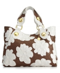 The perfect warm weather look for the beach and beyond. The Hibiscus tote from Big Buddha features shiny goldtone hardware, an all-over hibiscus design and a perfectly totable silhouette. The perfect warm weather look for the beach and beyond. The Hibiscus tote from Big Buddha features shiny goldtone hardware, an all-over hibiscus design and a perfectly totable silhouette.