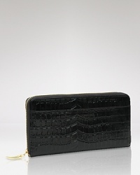 Take a shine to practical accessories with this croc-embossed leather wallet from Tusk. It's profile is pocket perfect, while a glossy exterior lends polish. Take a shine to practical accessories with this croc-embossed leather wallet from Tusk. It's profile is pocket perfect, while a glossy exterior lends polish.