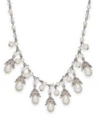 Lauren by Ralph Lauren goes for classic cool with this necklace. Crafted from silver tone brass, the link necklace features an array of glass pearls for an elegant touch. Approximate length: 18 inches. Approximate drop: 1/2 inch. Lauren by Ralph Lauren goes for classic cool with this necklace. Crafted from silver tone brass, the link necklace features an array of glass pearls for an elegant touch. Approximate length: 18 inches. Approximate drop: 1/2 inch.