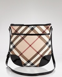 An iconic crossbody bag from Burberry in a compact and effortless style. An iconic crossbody bag from Burberry in a compact and effortless style.