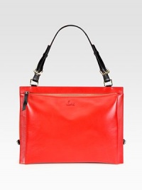 Pebbled-grain sides add texture to this two-tone style of sumptuously-smooth Italian leather. Adjustable shoulder strap, 8¾-9¾ dropTop zip closureProtective metal feetTwo inside zipper compartmentsOne inside zip pocketOne inside open pocketSignature red lining13W X 11H X 5DMade in Italy Pebbled-grain sides add texture to this two-tone style of sumptuously-smooth Italian leather. Adjustable shoulder strap, 8¾-9¾ dropTop zip closureProtective metal feetTwo inside zipper compartmentsOne inside zip pocketOne inside open pocketSignature red lining13W X 11H X 5DMade in Italy