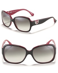 Vibrant color radiates from the interior of these chic oversized sunglasses from MICHAEL Michael Kors. With large logo detail at temples, it's the kind of accessory that makes people take notice. Vibrant color radiates from the interior of these chic oversized sunglasses from MICHAEL Michael Kors. With large logo detail at temples, it's the kind of accessory that makes people take notice.