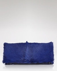 The power clutch is the bag to want now, and this Elie Tahari style works the trend in textured goat fur with a streamlined silhouette. The power clutch is the bag to want now, and this Elie Tahari style works the trend in textured goat fur with a streamlined silhouette.