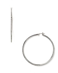 Add eve-catching sparkle to your look with these pave hoop earrings from Lauren Ralph Lauren. Add eve-catching sparkle to your look with these pave hoop earrings from Lauren Ralph Lauren.