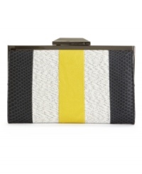 Add this chic clutch to your outfit for your next night on the town. A canvas exterior makes it casual enough for dinner and drinks, while a sleek snakeskin trim will easily take it to after hours. Add this chic clutch to your outfit for your next night on the town. A canvas exterior makes it casual enough for dinner and drinks, while a sleek snakeskin trim will easily take it to after hours.