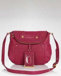MARC BY MARC JACOBS' leather crossbody looks classic but plays it cool. Get prepped: this purse adds a color-pop punch to those pearls. MARC BY MARC JACOBS' leather crossbody looks classic but plays it cool. Get prepped: this purse adds a color-pop punch to those pearls.