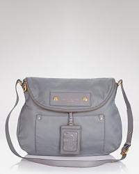 Strike a versatile note with MARC BY MARC JACOBS' nylon crossbody. Go back to basics: This practical bag is designed to keep pace with whatever your day (or closet) has planned. Strike a versatile note with MARC BY MARC JACOBS' nylon crossbody. Go back to basics: This practical bag is designed to keep pace with whatever your day (or closet) has planned.
