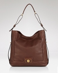 Bring daytime style to new, luxurious, heights with this leather hobo from MARC BY MARC JACOBS. It's an effortless over-the-shoulder style, accented with the label's signature hardware. Bring daytime style to new, luxurious, heights with this leather hobo from MARC BY MARC JACOBS. It's an effortless over-the-shoulder style, accented with the label's signature hardware.