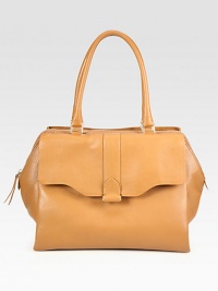 Luxurious deer leather in a roomy carryall, perfectly sized for all your essentials.Double shoulder strap, 8½ dropTop zip closureProtective metal feetOne outside flap pocketOne outside open pocketTwo inside open pocketsSatin lining13½W X 11H X 5DMade in Italy Luxurious deer leather in a roomy carryall, perfectly sized for all your essentials.Double shoulder strap, 8½ dropTop zip closureProtective metal feetOne outside flap pocketOne outside open pocketTwo inside open pocketsSatin lining13½W X 11H X 5DMade in Italy